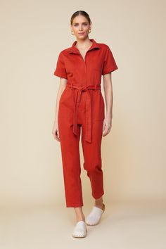 Our favorite 30-second outfit. This popular utility-inspired jumpsuit zips up at the front and cinches with a self-tie belt. It's got short sleeves and a straight-leg silhouette with pockets aplenty. •Short sleeves •Zip placket •Self-tie belt •Patch pockets •Straight-leg silhouette •Elastic Waistband Item Number: 73863 Short Sleeve Denim Utility Jumpsuit For Workwear, Utility Style Denim Jumpsuit With Short Sleeves For Work, Belted Utility Jumpsuit For Workwear, Utility Belted Jumpsuit For Workwear, Fall Workwear Jumpsuits And Rompers With Belt Loops, Utility Style Belted Jumpsuit For Fall, Cotton Jumpsuits And Rompers For Work With Tie Waist, Utility Short Sleeve Overalls For Workwear, Utility Style Short Sleeve Overalls For Workwear