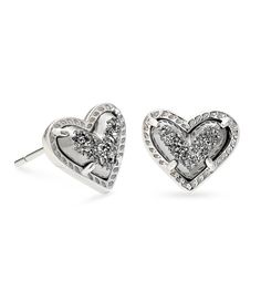 Calling all romantics&#033; The Ari Heart Stud Earrings are a fresh take on an old jewelry box favorite. This pair of stud earrings brings a delicate touch to any look that'll have you wearing your hair up.Metal rhodium plated over brassPost backapprox. 0.49" L x 0.557" WImported.Please note: Due to the one-of-a-kind nature of the medium&#x2C; exact colors and patterns may vary slightly from the image shown. White Gold Double Heart Earrings For Pierced Ears, White Gold Jewelry With Double Heart And Matching Earrings, White Gold Double Heart Jewelry Set With Earrings, Silver Tarnish Resistant Heart Earrings For Anniversary, Heart Cut Metal Jewelry For Anniversary, Double Heart Matching Earrings For Anniversary, Silver Double Heart Tarnish Resistant Jewelry, Silver Heart Earrings Tarnish Resistant, Silver Tarnish Resistant Double Heart Jewelry