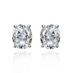 PRICES MAY VARY. Classic Design: This diamond earring features a stunning oval cut 2 Carat (4ct/pair) synthetic diamond in classic four-prong setting, each diamond is meticulously cut with the finest craftsmanship for maximum the sparking brilliance and luster in every angle. It's simple, classic and chic. Wear this diamond earrings to add sophistication and elegance to your look. Synthetic Diamonds: The new high quality synthetic diamonds are lab-created diamonds. they are rich in shape and col Classic Oval Diamond Earrings For Gift, Classic Oval Diamond Earrings As Gift, Oval Diamond Cut Earrings For Gift, Oval Diamond Cut Cubic Zirconia Earrings, Classic Oval Bridal Earrings With Brilliant Cut, Diamond White Oval Diamond Cut Earrings, Oval Diamond White Earrings For Anniversary, Oval Diamond Cut Earrings In Diamond White, Oval Diamond White Bridal Earrings