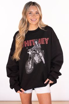 Rock out in style with this oversized sweatshirt paying tribute to the legendary Whitney Houston. This graphic sweatshirt is perfect for pairing with shorts, leggings, or biker shorts for a funky, edgy look. The sweatshirt fits like an extra large. Maddie is 5'3 and is wearing a one size fits all Machine Wash Cold Tumble Dry Low 90% Cotton & 10% Polyester Trendy Streetwear Sweats With Ribbed Cuffs, Edgy Oversized Hoodie With Letter Print, Oversized Edgy Hoodie With Graphic Print, Edgy Oversized Graphic Print Hoodie, Edgy Oversized Hoodie With Graphic Print, Edgy Crew Neck Sweatshirt For Winter, Edgy Crew Neck Winter Sweatshirt, Edgy Crew Neck Hoodie For Fall, Oversized Black Edgy Sweatshirt