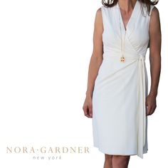 A Sleeveless Wrap Dress Featuring A Hidden Tie On The Inside,A V Neckline And A Self Side Tie Measurements: (0) 33", Waist 26" (2) Bust 34", Waist 27", (4) Bust 35", Waist 28" (6) Bust 36", Waist 29" Fabric Content: 79% Viscose, 13% Polyester, 7% Polyamide, 1% Elastane Elegant Off-white Sleeveless Midi Dress, Sleeveless Wrap Dress, Cream White, Wrap Dress, Womens Dresses, Cream, Fabric, Dresses, Women Shopping