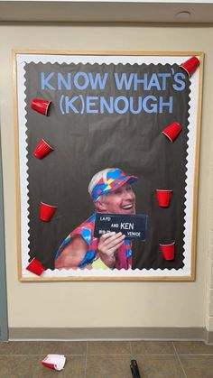 a poster on the wall that says know what's kenough, with red cups around it