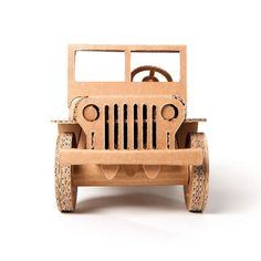 a wooden toy jeep is shown on a white background