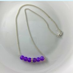 "🌸 Sign up for the Starfish by Kristan email list and get 15% off your order NOW! https://mailchi.mp/13833f6189a3/new-customers 🌸 Looking for high quality, affordable jewelry?  If so, this necklace is for you!  Beautiful silver bar necklace, wire wrapped with tarnish free silver wire with amethyst glass beads.  Each bead in this necklace is hand selected and wire wrapped with high quality tarnish free silver wire and linked to tarnish free silver cable link chain to ensure the best quality.  Necklace has a lobster claw closure.    Hypoallergenic.   OUR JEWELRY IS... *Made with high quality lava stones, semi-precious beads, silver, and glass beads *Tarnish free silver wire & gold wire, 925 silver, 1mm stretch cord, waxed linen cord *Crafted in house *Available in sizes 16\" and 18\" CARE Purple Necklaces With Colorful Beads For Gift, Purple Necklace With Colorful Beads For Gift, Purple Beaded Necklaces With 8mm Beads For Gifts, Purple Beaded Necklaces With 8mm Beads As Gift, Purple Polished Beads Crystal Necklace As Gift, Purple Beaded Necklace With 8mm Beads As Gift, Lavender Beaded Chain Jewelry For Gifts, Purple Necklace With Spacer Beads As Gift, Purple Necklaces With Spacer Beads For Gift