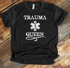 This Trauma Queen design is a funny EMT joke that captures the drama an EMS worker experiences and the truth about how much our medical frontliners help traumatized patients on a daily which, ironically, can also be traumatic for them. If you know someone who is an EMT, paramedic, ER nurse, doctor, or anyone who provides emergency medical services, this design great is for them ----- Check listing pictures for size charts. Let me know if you have any questions! MEN'S UNISEX TEE (Eco-Friendly): T Queen Design, Emt Paramedic, Queen Shirt, Emergency Medical Services, Er Nurse, Moon Shirt, Nurse Doctor, Queen Shirts, Medical Services