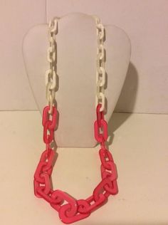 "Gorgeous pink and white long chunky resin link necklace. 40\" total length." Pink Chunky Chain Necklace, Pink Chunky Chain Link Necklace, White Chunky Link Chain Necklaces, White Resin Necklaces, Pink Chunky Chain Link Jewelry, Pink Chunky Link Chain Jewelry, Trendy Pink Plastic Necklace, Trendy Pink Plastic Necklaces, Trendy White Link Necklace