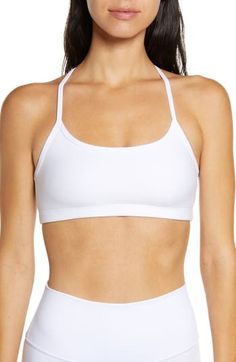 Slim racerback straps enhance the sporty, modern style of a space-dyed sports bra that's ideal for medium-impact activities. 10 1/2" length (size Medium) Medium-impact support Lined 87% polyester, 13% Lycra® spandex Machine wash, tumble dry Made in the USA of imported fabric Women's Clothing Athleisure T-back Sports Bra With Seamless Construction, Sporty Seamless T-back Sports Bra, Sporty Sports Bra With Medium Support And Tank Straps, Sporty Medium Support Sports Bra With Tank Straps, Seamless Sports Bra With Tank Straps, Racerback Sports Bra With Adjustable Straps For Light Sports, Athleisure Sports Bra With Adjustable Straps For Light Sports, Sporty Seamless Sports Bra With Tank Straps, Functional Racerback Sports Bra With Adjustable Straps