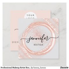 a pink and white business card with the words feminine boutique on it's front