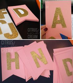 some pink and gold paper cut out to look like letters