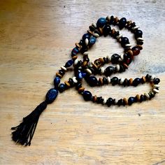 Chant Your Japa On This Handmade Mala. 108 Beads + A Guru Bead. Strong Black Nylon Cord. The Glass Beads Are Hand-Blown. It Measures 34 Inches And Is Very Light-Weight. This One-Of-A-Kind, Handmade Mala Necklace Has 108 Beads For The Purpose Of A Bhakti Yoga Practice Of Chanting Mantra. One Bead Counts One Repetition Of Your Mantra. New. Bohemian Wooden Beads Mala For Festival, Bohemian Festival Mala With Wooden Beads, Brown Beaded Necklace With Black Beads For Gift, Brown Beaded Necklaces With Black Beads For Gift, Brown Beaded Necklace With Black Beads As Gift, Black Wooden Beads For Beach, Brown Beaded Bracelets For Healing, Healing Brown Beaded Bracelets With Colorful Beads, Amber Beaded Necklace For Meditation