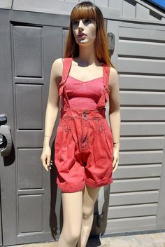 Cute pair of Vintage 80's  Red over dyed denim overalls shorts.   Legg cuffs.  It is missing the little rod on the shoulder buckle that goes through the hole on one side but the still work just fine with the  strap buckles.     They have adjustable shoulder straps and  a zipper  fly.  Measurements are taken with item laying flat so widths across must be doubled  Length = 18   in   in (measured without the straps, from the top of waist down to leg hems) Across the Waist = 16   in Across the Hips Vintage Overall Shorts, Retro Dark Wash Cotton Shortalls, Red Overall Shorts, Vintage Denim Blue Cotton Shortalls, Blue Vintage Cotton Shortalls, 80s Denim, Denim Overalls Shorts, Girls Overalls, Overalls Women