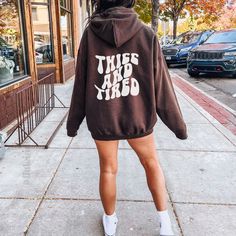 Some of us are thicc and tired, let us liveeeee. This is a funny hoodie you can wear to your next lifting session. Let's stay thicc y'all! Great gift idea for your favorite gym rat too. This print is only on the back of the hoodie, front is left blank.  This unisex heavy blend hooded sweatshirt is relaxation itself. Made with a thick blend of cotton and polyester, it feels plush, soft and warm, a perfect choice for any cold day. In the front, the spacious kangaroo pocket adds daily practicality Oversized Hoodie For Workout In Fall, Cozy Cotton Hoodie For Workout, Oversized Cotton Workout Hoodie, Fall Gym Hoodie With Letter Print, Trendy Workout Hoodie, Oversized Hoodie Sweatshirt For Gym, Cotton Workout Hoodie With Graphic Print, Graphic Print Sweatshirt For Fall, Fall Gym Sweatshirt With Graphic Print