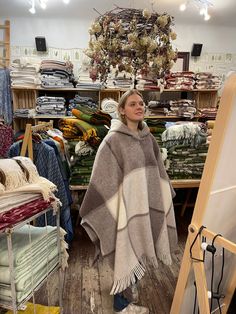 Beige wool poncho cape with hood large check Beige/cream white hooded poncho cape Lambswool blanket poncho cape Hooded lambswool poncho cape One size fits fashionably for most everyone, short or tall, big or small. This piece is versatile for both Men's & Women's outdoor fashion, and can be used insider in cooler winter weather to keep warm while reading on the couch. CARE: Hand-wash and hang to dry, light iron if needed, or dry clean. MEASURES: Length at the front of the neckline to the bottom Cream Poncho Outfit, Beige Hooded Poncho For Fall, Cream Winter Cape Poncho, Cream Cape Poncho For Winter, Winter Cream Poncho Cape, Cream Poncho Cape For Winter, Womens Outdoor Fashion, Poncho Outfit, Cape With Hood