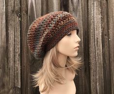 "Crochet Hat Style: Weekender Slouchy Hat - a slouchy beanie for women, men and teens. Color: This sample hat is shown in Chocolate Peacock, a mix of browns, rusts, golds and teals. Sizes: One size fits 20\" to 23\" (50.5 cm to 58 cm) head size. Fiber Content: 100% acrylic Characteristics: Chunky, very soft, warm and cozy. Care Instructions: Hand wash, dry flat. Every item from Pixiebell is handmade and knit or crocheted to order, unless otherwise stated in title of the item as \"ready to ship\". Production time may vary, please check the SHIPPING & POLICIES tab for accurate processing times. If you need an item promptly, please contact us so that we can make arrangements. While every effort is made to accurately represent the true colors of the yarns used in our work, your monitor setting Bohemian Adjustable Beanie For Fall, Brown Bohemian Beanie One Size, Slouchy Cap For Outdoor, Slouchy Outdoor Cap, Bohemian Crochet Beanie Hat For Outdoor, Bohemian Crochet Beanie For Outdoor, Bohemian Knitted Hat For Fall, Bohemian Knitted Fall Hat, Warm Bohemian Beanie For Fall