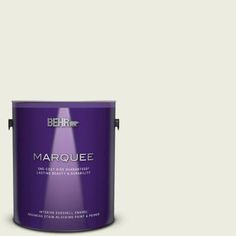 behr marquee interior paint in one gallon, with the lid open and it's base painted off