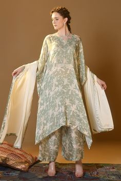 Green kaftan featuring cutdana and pearl embroidery with floral pattern all over. Paired with a coordinating palazzo and a piping detailed dupatta. - Aza Fashions Green Kaftan, Pearl Embroidery, Palazzo Set, Satin Color, Set For Women, Aza Fashion, Fashion Set, Piping, Floral Pattern