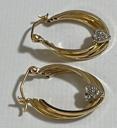 "Beautiful 14K Yellow Gold 1\" Diamond Heart Hoop Earrings Beautiful hoop earrings with a heart on bottom of hoop with genuine diamonds! Earrings measure approximately 1\" long x 6/8\" wide. Weight is 2.2 grams Absolutely beautiful! Please message me with any questions Shipped insured in a gift box I guarantee item to be exactly as described and pictures." Heart-shaped Fine Jewelry Hoop Earrings For Anniversary, Small Hoop Earrings For Valentine's Anniversary, Anniversary Heart-shaped Fine Hoop Earrings, 14k Stamped Hoop Earrings For Anniversary, Anniversary 14k Stamped Fine Hoop Earrings, Pierced Hoop Heart Earrings For Anniversary, 14k Gold Heart-shaped Hoop Earrings For Anniversary, Pierced Open Heart Hoop Earrings For Anniversary, Hoop Earrings For Valentine's Day Anniversary