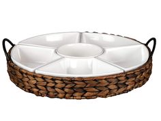 an oval serving tray with four bowls in the center and two handles on each side