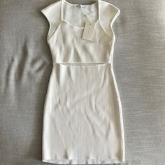 Size S White Fitted Bodycon Dress For Summer, White Casual Bodycon Summer Dress, White Casual Bodycon Dress For Summer, Casual White Bodycon Dress For Day Out, White Feminine Sleeveless Bodycon Dress, Feminine White Sleeveless Bodycon Dress, White Fitted Midi Dress For Summer, White Bodycon Midi Dress For Spring, White Short Sleeve Bodycon Dress For Summer