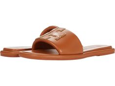 Tory Burch Double T Sport Slide - Women's Shoes : Aged Camello/Gold : Slip right into style and comfort with Tory Burch Double T Sport Slides! Upper, lining, and insole made of leather material. Slip-on construction. Iconic Tory Burch double T logo on vamp. Open snip-toe silhouette. Man-made outsole. Imported. Measurements: Weight: 7 oz Product measurements were taken using size 9, width M. Please note that measurements may vary by size. Weight of footwear is based on a single item, not a pair. Classic Tan Sandals With Leather Sole, Classic Tan Sandals With Leather Lining, Casual Tan Sandals With Leather Lining, Tan Leather Casual Sandals, Casual Tan Sandals With Leather Sole, Classic Tan Leather Sandals, Luxury Leather Slides With Tang Buckle, Classic Tan Slip-on Sandals, Tan Leather Slip-on Sandals