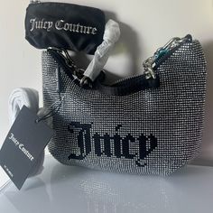 Omg! Stunning One Of A Kind Nwt Juicy Couture Bag From The Uk. This Bag Is Truly Such A Stunner! Perfect For A Collector. She Comes With A Crossbody And Pouch That Attaches To The Inside. Please Get Into The Detail! The Bag Is In Perfect Condition There Is One Dull Crystal On The Front But It Is Not Missing! Bundle Other Nwt Designer Clothes Bags And Jewelry From My Closet For An Offer Designer Silver Shoulder Bag With Rhinestones, Juicy Couture Daydreamer Bag, Big Juicy Couture Bag, Old Juicy Couture Bags, Juicy Couture Bags Black, Juicy Couture Leopard Bag, Juicy Couture Bags, Juicy Couture, Black Silver