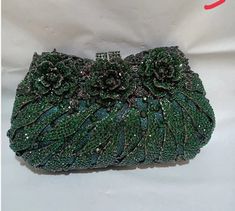 46465678868713 Elegant Green Handheld Clutch, Elegant Green Handheld Evening Bag, Green Pouch Clutch For Wedding, Green Handheld Clutch For Wedding, Green Clutch Evening Bag For Wedding, Designer Green Clutch For Formal Occasions, Designer Green Evening Bag For Formal Occasions, Handheld Green Clutch For Wedding, Designer Wedding Clutch Evening Bag