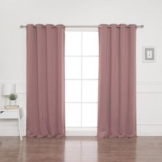 a living room with pink curtains and hardwood floors in front of a white wall that has an open window