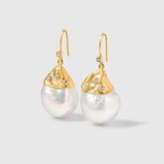 "Large, White, 54ct Baroque Pearl Earrings with Diamonds, in 24kt Gold by Prehistoric Works of Istanbul, Turkey. Length: 34mm (1.4\"); Width: 15.5mm (.6\"). Throughout the centuries, pearls have been associated with wealth, femininity, purity, wisdom, patience and peace. Due to their appearance, they have often been compared to the moon, and are said to have a calming, protective and strengthening effect on the wearer. It is also the birthstone for the month of June." Opulent Gold Earrings Gift, Opulent Gold Earrings As Gift, Opulent Gold Earrings For Gift, Opulent Gold Earrings For Formal Occasions, Luxury Baroque Earrings For Gift, Luxury Baroque Earrings As Gift, Luxury Baroque Gift Earrings, Classic Yellow Gold Baroque Earrings, Classic Baroque Yellow Gold Earrings