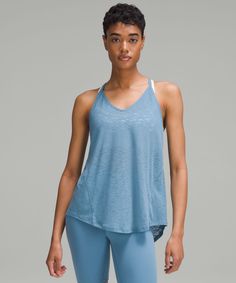 Hold That Power Pose A Little Longer. This Lightweight And Breezy Tank Can Be Tied Tight Or Left Loose In The Back For Extra Airflow During High-Intensity Sequences. Designed For Yoga. An Easy Fit That Floats Away From Your Body:sits Below The Waistband For Moderate, Everyday Coverage:tie It Up For A Snug Fit At The Hip. | Tie-Back Lightweight Yoga Tank Top Power Pose, Yoga Tank Top, Yoga Tank, Yoga Tank Tops, Sports Wear, Sport Wear, Sheer Fabrics, Sleeveless Tank Top, Tie Backs