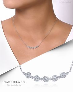 A gently curving string of shimmering round diamonds is suspended on a delicate white gold chain. NK5802W45JJ #GabrielNY #DiamondJewelry #FineJewelry #GabrielAndCo #UniqueJewelry #FineJewelry#FashionJewelry#UniqueJewelry#GiftIdeas#UniqueGifts #DiamondJewelry #Jewelry#Necklaces #DiamondNecklace #GoldNecklace Luxury Round Station Necklace For Formal Events, Luxury Round Station Necklace For Formal Occasions, Luxury Elegant Round Station Necklace, Luxury Sterling Silver Round Station Necklace, Luxury Round Sterling Silver Station Necklace, Luxury Classic Station Necklace For Anniversary, Luxury Silver Station Necklace For Anniversary, Diamond Bar Necklace, Curved Bar