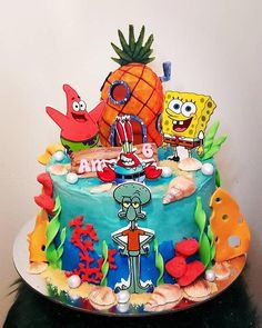 a spongebob themed birthday cake on a table