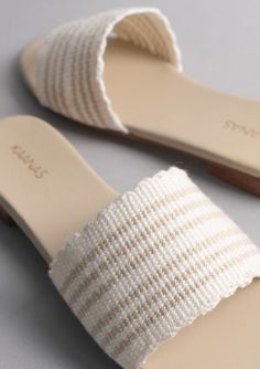 Upper: 100% Cotton Lining: Leather Inner Sole: Leather Sole: P/U Fit Comments: True to size Half sizes should size up if regular-width or size down if narrow width Sage Handwoven Slide Sandal Comfortable Beige Slides With Woven Sole, Casual Beige Slides With Textured Sole, Beige Flat Slides With Textured Sole, Casual Beige Slides With Woven Sole, Beige Flat Slides With Woven Sole, Beige Slides With Textured Sole And Round Toe, Beige Slides With Cushioned Footbed And Flat Heel, Beige Flat Slides With Removable Insole, Casual Cream Slides With Textured Footbed