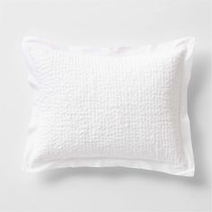 a white pillow on a white background