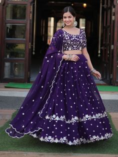 Introducing our fabulous violet embroidered georgette function wear lehenga choli, the perfect outfit for your special occasions. This stunning ensemble features a violet color georgette lehenga with heavy sequin and embroidered work, paired with a matching georgette choli adorned with heavy sequin work and multi-embroidered detailing. The look is completed with a georgette dupatta featuring sequin multi-embroidered arco cut work and designer lace work.
This outfit includes high-quality georgett Ceremonial Wedding, Purple Lehenga, Heavy Lehenga, Lehenga Crop Top, Bridesmaid Lehenga, Indian Lehenga Choli, Lehenga Choli Wedding, Floral Lehenga, Party Wear Lehenga Choli