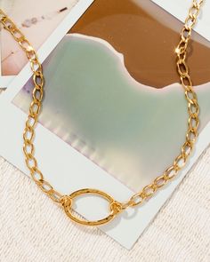 Boasting a beautiful golden plating that is perfectly crafted to accentuate all skin tones, this piece is sure to flatter every look. Not only is this piece beyond stunning, but it's also extremely versatile and can easily transition from day to night. Wear it as a single layer or layer it up - it's completely up to you! Gold Metal Chain Choker Necklace, Gold Metal Necklace Tarnish Resistant, Gold Tarnish Resistant Metal Necklace, Gold Tarnish-resistant Metal Necklace, Tarnish Resistant Gold Metal Necklace, Gold Chain Necklace For Everyday Use, Gold Link Necklace With Adjustable Fit, Chic Gold-tone Chain Necklace With Clavicle Chain, Adjustable Gold Link Necklace