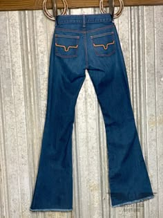 Our best selling Kimes Ranch Jeans have a new twist! The Raw Hem Lola's are a mid rise jean with a wide flare leg and raw hem. They have a flattering and comfortable fit. * Medium/dark wash * Gold Stitching * Run long and true to size * Medium weight denim with some stretch. * 93% Cotton 6% Polyester 1% Elastine * Made in USA Kimes Ranch Jeans Jennifer, Kimes Ranch Jeans Outfit, Kimes Jeans, Barrel Racing Outfits, Womens Western Outfits, Western Ootd, Kimes Ranch Jeans, Dream Pants, Country Jeans