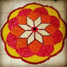 a large flower arrangement on the floor