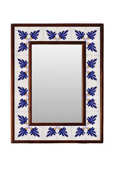 a mirror with blue and white flowers on it