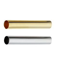 two gold and silver tubes are shown side by side on a white background, one is empty