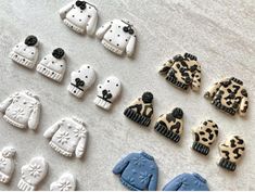 there are many different types of decorated cookies on the table with snowflakes and mittens