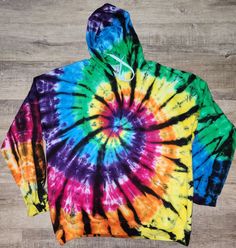 Processing time is 2 weeks. 80/20 cotton/poly blend hoodies it won't be exact to the listing photo but similar to it each one will be unique.  Wash along the first few washes on cold water. Tumble dry on low heat or air dry(recommended) Multicolor Fleece Hoodie, Multicolor Fleece Hoodie Top, Multicolor Fleece Sweatshirt With Drawstring Hood, Tie Dye Cotton Top With Drawstring Hood, Rainbow Casual Winter Hoodie, Casual Winter Rainbow Hoodie, Multicolor Drawstring Hooded Sweatshirt, Rainbow Cotton Hoodie, Multicolor Hoodie Sweatshirt With Drawstring