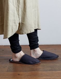 FINAL SALE Fog Linen Slippers Breathable linen and luxe leather bottom's make these slippers perfect for cruising around the house. Simple, functional, and comfortable, the sizing is unisex, M or L. Be sure to measure your foot before ordering. medium: 10.25" interior footbed large: 0.75" interior footbed 100% linen uppers/ suede leather solespot clean or hand-wash only Comfortable Black Slip-ons, Comfortable Slip-on Slippers With Soft Sole, Comfortable Black Slippers With Leather Sole, Comfortable Black Slippers For Casual Wear, Comfortable Black Slippers For Leisure, Comfortable Black Slip-on Slippers, Comfortable Comfy Slippers With Rubber Sole, Comfortable Closed Toe Slippers With Soft Sole, Comfortable Slip-ons With Soft Sole