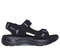 Supportive all-day comfort arrive in Skechers GO WALK Arch Fit Sandal - Mission II. This sporty sandal has been granted the APMA Seal of Acceptance. Featuring a synthetic perforated upper, adjustable strap closures, lightweight ULTRA GO cushioning, and a contoured Goga Mat footbed with podiatrist-certified Arch Fit support. | Skechers Men's GO WALK Arch Fit - Mission II Sandals | Medium Width | This design has been granted the Seal of Acceptance by the American Podiatric Medical Association (APM Breathable Open Toe Sport Sandals For Walking, Open Toe Sport Sandals With Arch Support, Functional Open Toe Sport Sandals With Arch Support, Sporty Ergonomic Breathable Sandals, Sporty Sport Sandals With Arch Support, Sport Sandals With Gel Cushioning And Synthetic Material, Synthetic Sport Sandals With Gel Cushioning, Summer Sports Sandals With Ortholite Insole, Sporty Sandals With Adjustable Fit For Sports