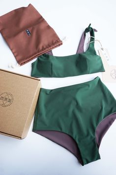 Reversible bikini set, M size in green +taupe color, 6 in 1 design- color combinations to wear it. "Riviera" set it is top with soft cups and elegant high waisted bikini. Eco Sun Day all swimwear made from sustainable fabric which is made from recycled ocean plastic and fishing nets. Composition- 78% Recycled PA + 22% EA. Ethycally made in Lithuania Ready to ship, sending same day! In case You would like to oder this set in other size or color , chek this made to oder item: https://www.etsy.com/ Reversible Swimsuit, Sun Day, Fishing Nets, Sustainable Fabric, Sustainable Swimwear, Reversible Bikinis, Taupe Color, Sustainable Fabrics, Design Color