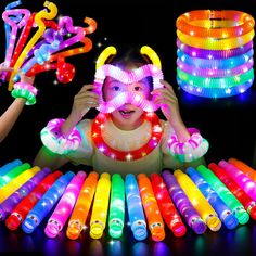 PRICES MAY VARY. 𝗨𝗻𝗶𝗾𝘂𝗲 𝗟𝗶𝗴𝗵𝘁 𝗨𝗽 𝗣𝗼𝗽 𝗧𝘂𝗯𝗲𝘀: 25 Pack UrChoice Light Up Pop Tubes comes in an assortment of 12 vibrant colors(red, orange, yellow, green, blue, purple, pink, deep blue). offering an array of choices for your glow parties, camping games, and movie night supplies needs. 𝗙𝘂𝗻 𝗣𝗮𝗿𝘁𝘆 𝗙𝗮𝘃𝗼𝗿𝘀: Ideal as Halloween party supplies, bag stuffers for birthday parties, wedding parties,and dance parties, these tubes add an extra glow to your events, ensuring they Dark Party Decorations, Dance Party Decorations, Pop Tube, Neon Party Supplies, Glow Stick Party, Glow In The Dark Party, Bulk Party Favors, Birthday Return Gifts, Sound Production