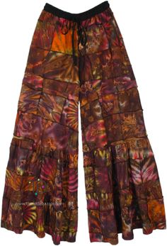 Add a pop of color and groove to your transition collection with these handmade patchwork wide-legged pants for the relatively tall! Made with heavy organic cotton, these pants feature a dark color scheme with unique reverse stitch patchwork pieces that have been tie-dyed before creating a design of the pants that is sure to turn heads. The wide legs offer a flowy and comfortable fit, perfect for bohemian and hippie-inspired styles. #tlb #SplitSkirtsPants #Patchwork #Striped #Tall #XLPlus #B... Cotton Patchwork Wide-leg Pants, Hippie Style Cotton Pants For Fall, Hippie Patchwork Bottoms For Fall, Brown Patchwork Wide Leg Bottoms, Hippie Wide-leg Patchwork Pants, Hippie Wide Leg Patchwork Pants, Festival Brown Patchwork Bottoms, Festival Patchwork Wide Leg Bottoms, Wide Leg Patchwork Bottoms For Festival