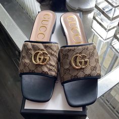 Stylish Gucci Sandals Never Worn. Gucci Luxury Mules With Branded Heel, Luxury Gucci Mules With Branded Heel Counter, Luxury Gucci Mules With Branded Heel, Gucci Open Toe Mules With Branded Heel Counter, Gucci Black Mules With Round Toe, Gucci Luxury Open Toe Mules, Black Gucci Mules With Round Toe, Gucci Luxury Sandals With Branded Insole, Gucci Designer Sandals With Round Toe