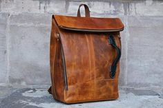 FREE SHIPPING TO UK, US, CANADA, AUSTRALIA & many EU countries !  MODEL NAME: Otley DESIGN: Truly sophisticated for the current age, Otley is definitely an attention seeker. Flaunt your swag with this contrast coloured piece of fine leather.  MATERIAL: Natural Cowhide Leather COLOUR: Brown STYLE: Rectangular Brown Waxed Backpack, Brown Rectangular Backpack With Waxed Finish, Modern Brown Rectangular Backpack, Brown Waxed Finish Rectangular Backpack, Rectangular Waxed Finish Brown Backpack, Classic Backpack As Gift, Brown Rectangular Leather Backpack With Waxed Finish, Brown Leather Rectangular Backpack With Waxed Finish, Brown Satchel Backpack For Gift