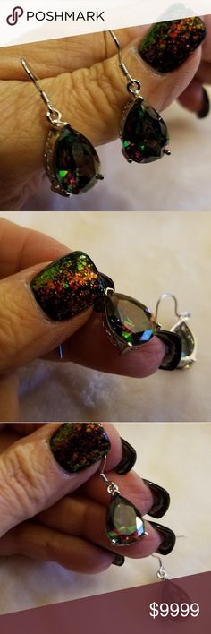 🌷 2/$20 💚💜Mystic Topaz Earrings2 👉REDUCED👈  💜💚Mystic Topaz Earwire Earrings2. Silvertone Setting. Gorgeous lab created stone. Dances of color. Pierced. Very Lightweight. 👉NWOT👈, never worn. Jewelry Earrings Elegant Multicolor Nickel-free Crystal Earrings, Nickel-free Crystal Earrings For Party, Nickel-free Round Crystal Earrings For Party, Adjustable Pierced Earrings For Parties, Multicolor Crystal Earrings For Evening, Multicolor Sterling Silver Earrings For Party, Multicolor Sterling Silver Party Earrings, Party Multicolor Sterling Silver Earrings, Adjustable Dangle Clip-on Earrings For Party