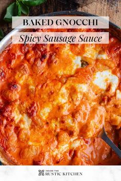 baked gnocchi with spicy sausage sauce in a skillet